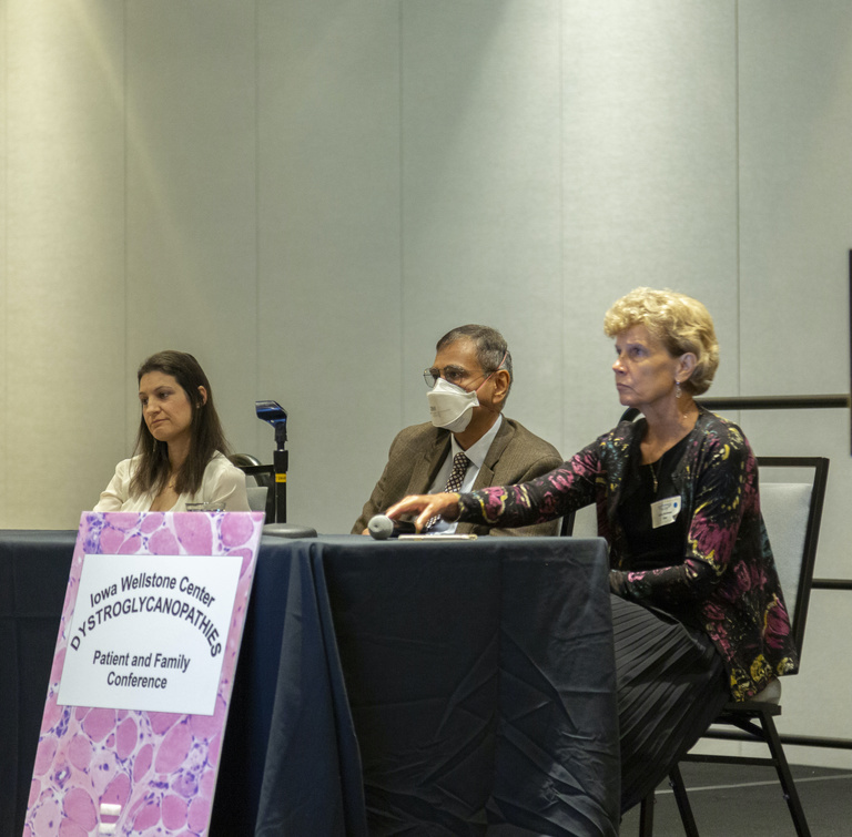 A panel, including Dr. Mathews, taking questions from audience at 2022 Dystroglycanopathies Patient and Family Conference