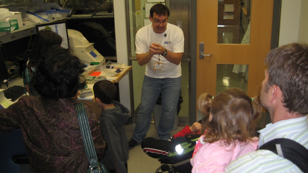trainees interact with patients and families during lab tours